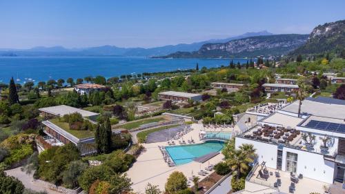 an aerial view of a resort with a swimming pool at Parc Hotel Germano Suites & Apartments in Bardolino