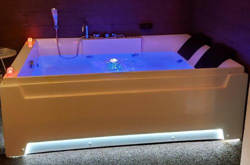 a hot tub in a room with at Taras Di San Vito Guest House in Taranto