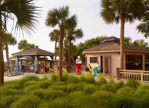 a group of people standing in front of a building at Omni Hilton Head Oceanfront Resort in Hilton Head Island