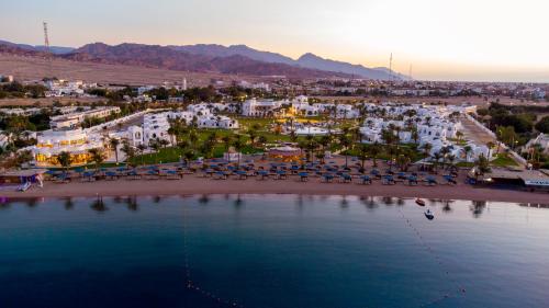 an aerial view of a resort with a beach at Safir Dahab Resort in Dahab