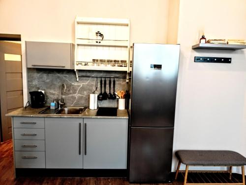 Dapur atau dapur kecil di Drzewna Apartamenty-Drzewna
