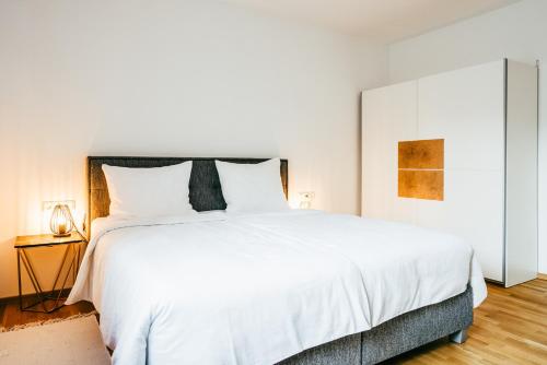 Postel nebo postele na pokoji v ubytování Love Suite