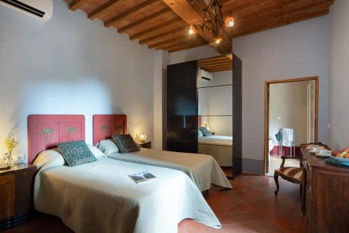 Llit o llits en una habitació de Villa Fracassini