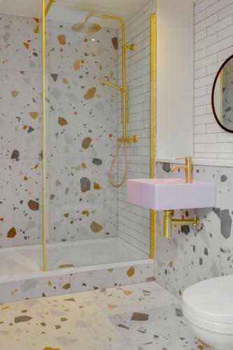a bathroom with a shower and a sink at CoalShed Lofts - Groups -Exclusive Use in Bristol