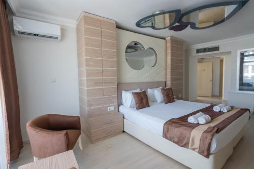 Cama o camas de una habitación en Hotel Caprea