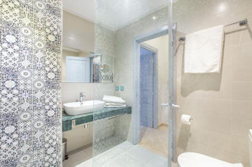 Ванная комната в Best Apartement For Group In Gueliz