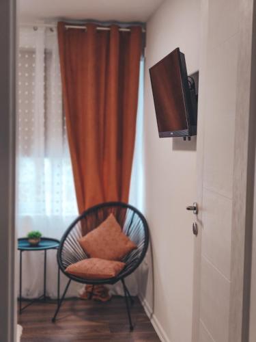 TV a/nebo společenská místnost v ubytování Villa-Apartments Bognar