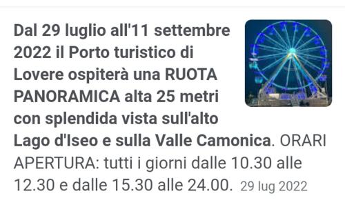a screenshot of a text message with a ferris wheel at Casa Tiziana in Sovere
