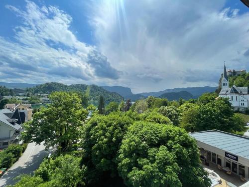 a view of a town with trees and a building at Apartment Lucy, Bled in Bled