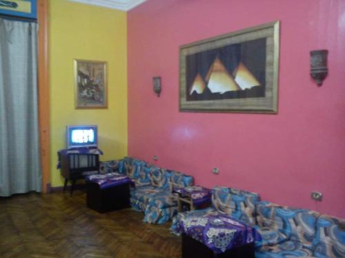 TV a/nebo společenská místnost v ubytování African House Hostel