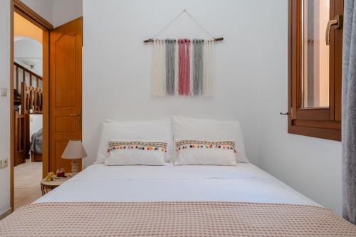 Small Apartment in Grotta Naxosにあるベッド