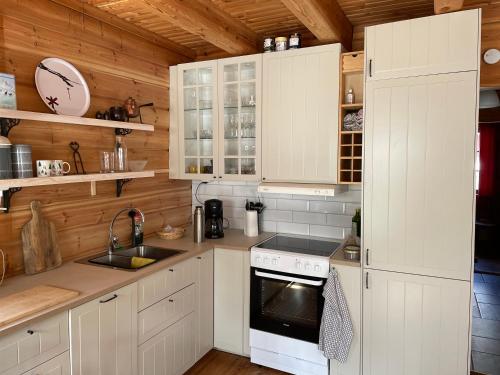 Una cocina o kitchenette en Nedre Alpen 19B