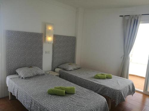 Ένα ή περισσότερα κρεβάτια σε δωμάτιο στο Meerblick Apartment Sabina