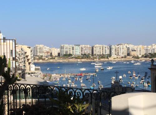 a view of a harbor with boats in the water at Rotas B&B in St Julian's