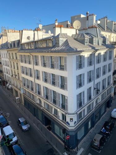 a large building with a lot of windows on the side of it at Holiday Inn Paris Elysées, an IHG Hotel in Paris