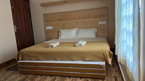 Cama o camas de una habitación en LAZY RETREAT