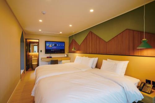 Cama o camas de una habitación en Hotel Pico