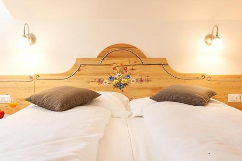 Llit o llits en una habitació de Hotel Due Spade