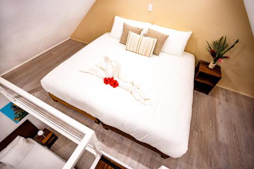 Ένα ή περισσότερα κρεβάτια σε δωμάτιο στο Aves Resort Montezuma