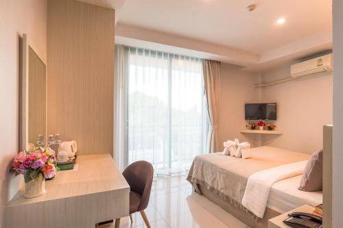 Katil atau katil-katil dalam bilik di Lada Krabi Residence Hotel - SHA Plus