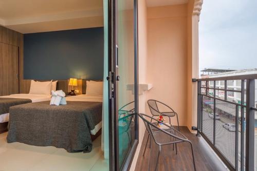 Katil atau katil-katil dalam bilik di Lada Krabi Residence Hotel - SHA Plus