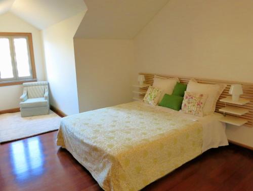 a bedroom with a large bed and a window at Finest Rentals - Beachfront Penthouse in Funchal