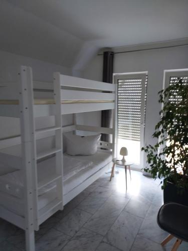 Ein Etagenbett oder Etagenbetten in einem Zimmer der Unterkunft Ferienhaus Magasch