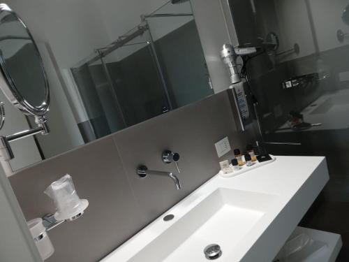 Koupelna v ubytování De Guidani Experience