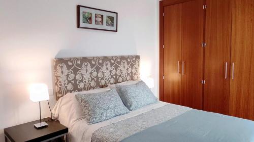 Posteľ alebo postele v izbe v ubytovaní Selecta Elegante Apartamento con Patio en Centro Historico