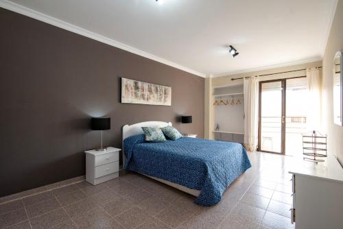 Ένα ή περισσότερα κρεβάτια σε δωμάτιο στο Los Baifos