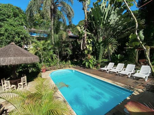 A piscina localizada em Pousada Recanto das Estrelas ou nos arredores