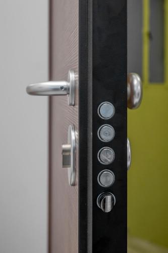a close up of a door with a handle at 2 Bedroom condo with dream balcony in Athens