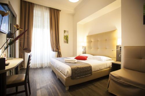 Katil atau katil-katil dalam bilik di Aventino Guest House