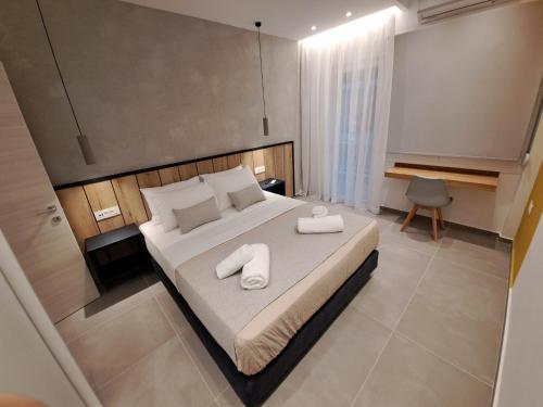 Postel nebo postele na pokoji v ubytování Pleasant Stay