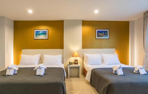 Katil atau katil-katil dalam bilik di Lada Krabi Residence Hotel - SHA Plus