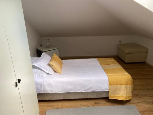Un ou plusieurs lits dans un hébergement de l'établissement Apartment Ajna