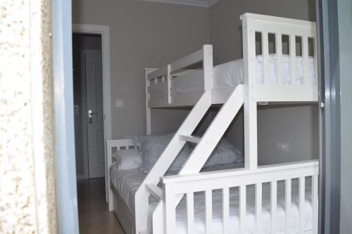 Postel nebo postele na pokoji v ubytování MARAVILLOSO APARTAMENTO VILANOVA DE AROUSA