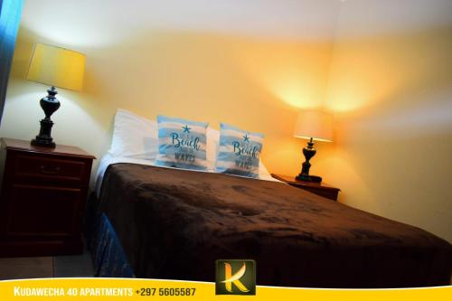 Ένα ή περισσότερα κρεβάτια σε δωμάτιο στο Kudawecha 40