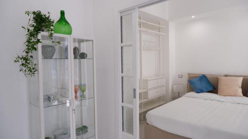 Ένα ή περισσότερα κρεβάτια σε δωμάτιο στο Apulian Home 192