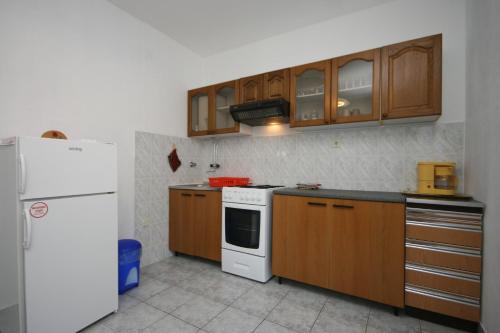 Kuchyň nebo kuchyňský kout v ubytování Apartments with a parking space Mandre, Pag - 6517