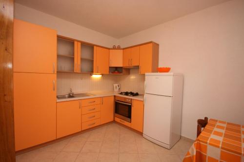 Kuchyň nebo kuchyňský kout v ubytování Apartments by the sea Podgora, Makarska - 6683