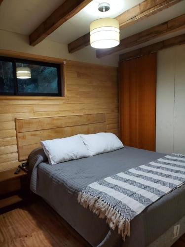 Postel nebo postele na pokoji v ubytování Casa Molino de Chiloé