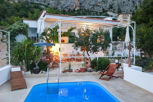 Fotografia z galérie ubytovania Family friendly house with a swimming pool Kotisina, Makarska - 6809 v destinácii Makarska