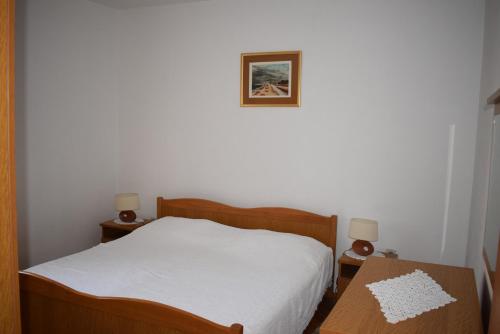Postel nebo postele na pokoji v ubytování Apartments with a parking space Novalja, Pag - 6491