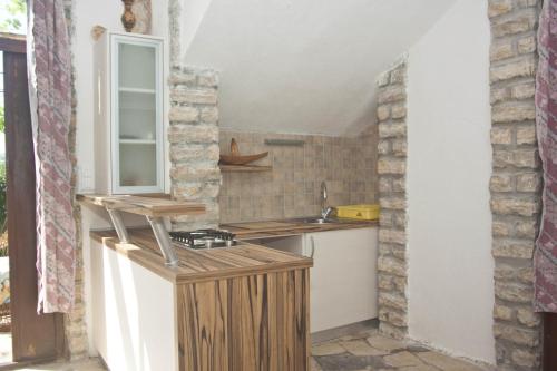 A kitchen or kitchenette at Apartments by the sea Okrug Gornji, Ciovo - 8330