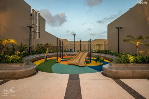 a playground in a building with a slide at The Song Luxury Condotel Vung Tau - Căn hộ cao cấp Luca's House in Vung Tau