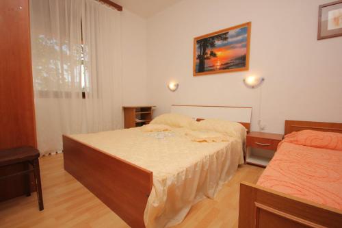 Llit o llits en una habitació de Apartments with a parking space Poljana, Ugljan - 8473