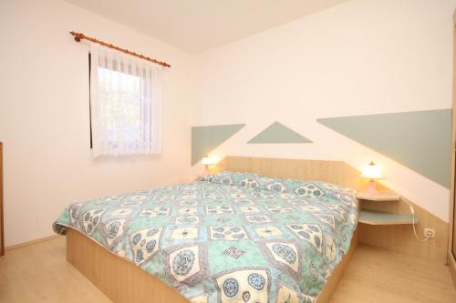 Posteľ alebo postele v izbe v ubytovaní Apartments by the sea Zdrelac, Pasman - 8406