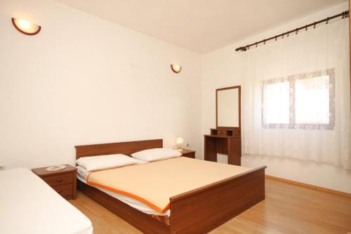 Posteľ alebo postele v izbe v ubytovaní Apartments by the sea Sali, Dugi otok - 8174