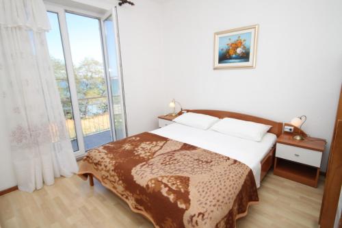 Postel nebo postele na pokoji v ubytování Double Room Tkon 8377b